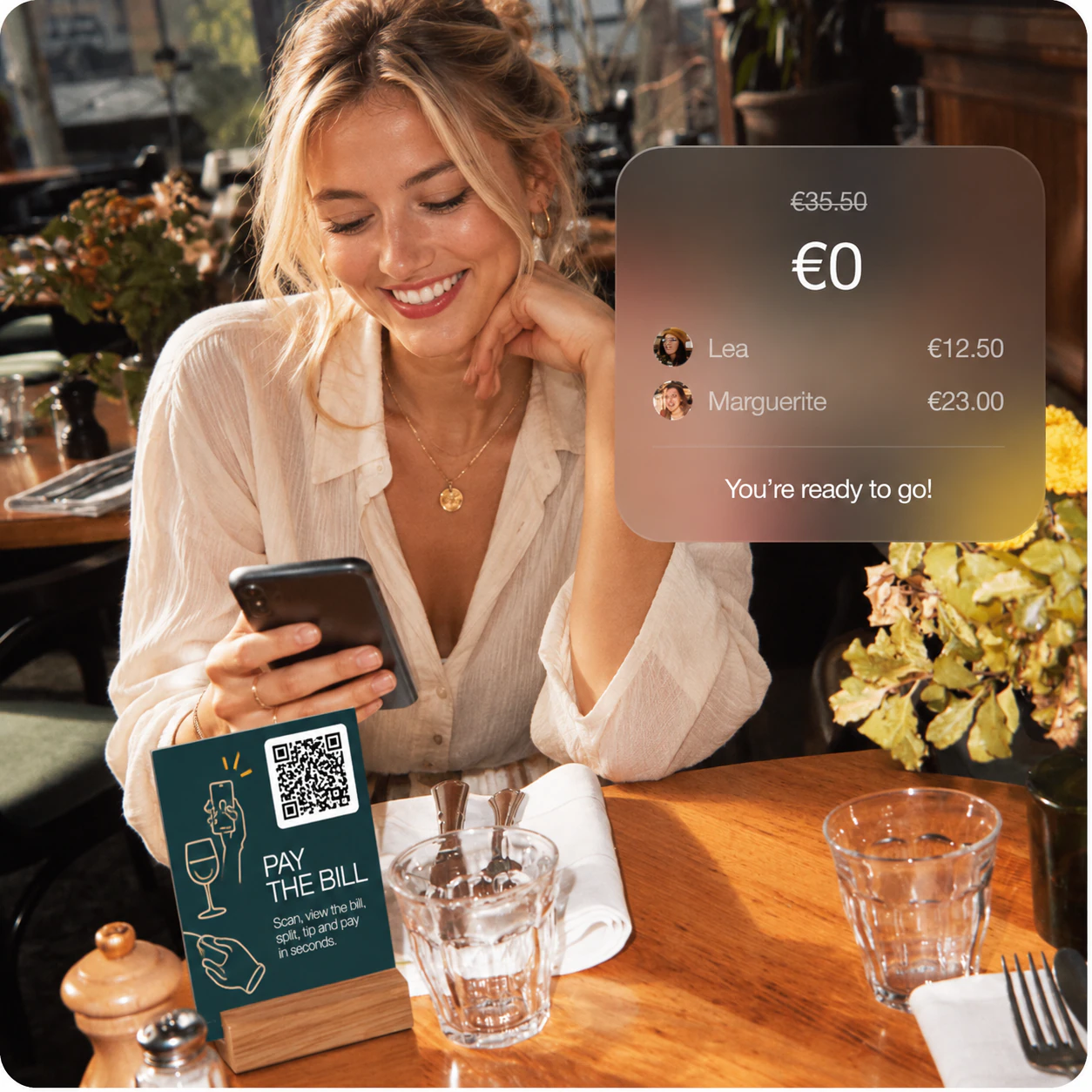 Guest paying the bill from their phone at a table with a Depnos QR stand